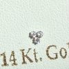 נזם זהב 14K ללא הברגה - שלישיית זרקונים נוצצת ועדינה